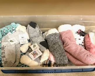 Brand new with tags fuzzy socks. These would make great gifts this Holiday Season. 