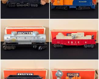 A collection of vintage Lionel Postwar O-gauge model trains and cars. 
The blue and orange locomotive is a Lionel 6250 Seaboard NW2 diesel switcher, produced in 1954 and 1955. 
The 6250 Seaboard was a premium locomotive in Lionel's 1954 O27 gauge set.
The red flatcar with "ERIE 3444" lettering is a power station car (model 3444), while the black hopper car is an automatic dump car (model 3469). 