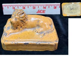 Late 19thC glazed lion paperweight signed SG Snyder. $90