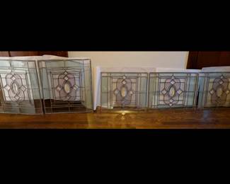 Stained glass and beveled  windows.  Set of five.  Very good cond. Two are 25"w x 29"h and three are 25"w x 21"h.  $150