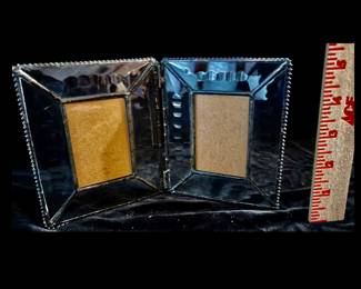 Double photo frame.  Glass and silver metal.  $10