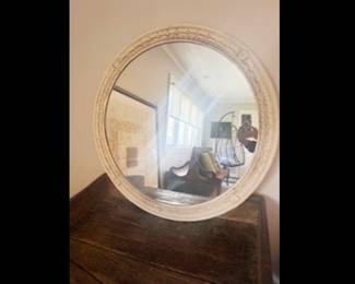 Antique Mirror.  Original mirrored glass and wonderful detailed plaster surround. 36” diameter  $425