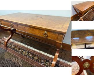 Baker Regency Burlwood Writing Desk with inlaid wood detail.  48" x 26" x 30" h.  Surface has a mar. $1500