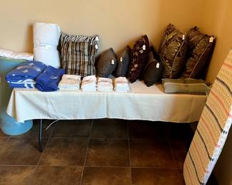 Linens & pillows galore throughout the home 