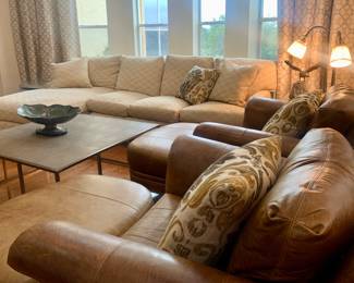 (2) leather oversized chairs with ottomans