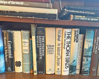 Various hardback books.