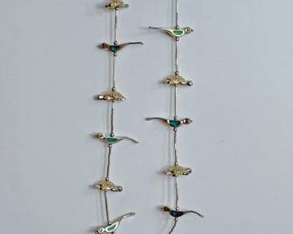 Sterling silver necklace featuring inlaid birds