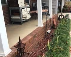 front porch is full! iron decor in the yard!