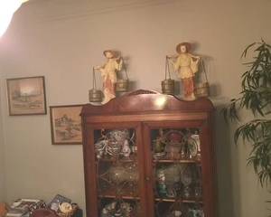 Antique china cabinet. Lots of glassware/dishes. Oriental figurines.