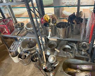 Lots of vintage utensils! Pans cooling racks, 
Cabinet liners.