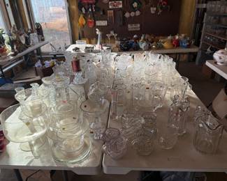 Glass and crystal pitchers, bowls, candle holders and decanters.