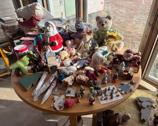 Toys, stuffies, miniature nativity, Christmas decorations.