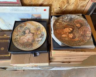 Collectible plates with original boxes and paperwork. 