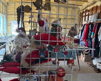 Christmas ornaments and lots of Christmas miscellaneous. Clothes size large and X large.