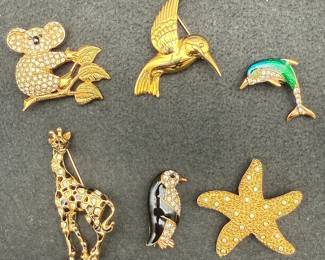 2 Swarovski Broaches 1 Napier 2 Kreme 1 Casual Corner Brooches