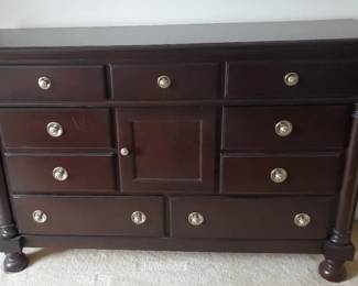 Wide Dark Wood Dresser With Nickel Hardware
