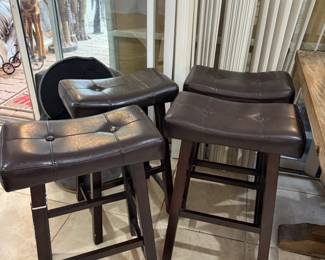 Set of 4 saddle stools