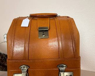 Vintage brown leather train case or cosmetic bag