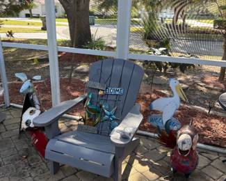 Gray adirondack chair, metal garden decor