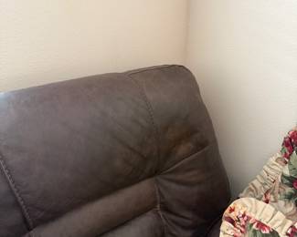 Light spot on loveseat headrest has been restored. 