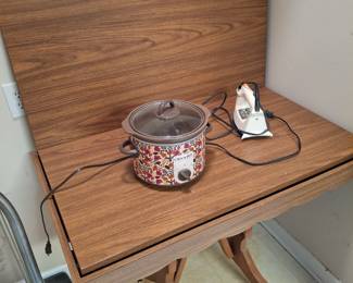 This table folds in half and rotates