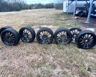 RIMS & TIRES REMOVED FROM A FORD