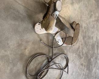 wood saddle and rope