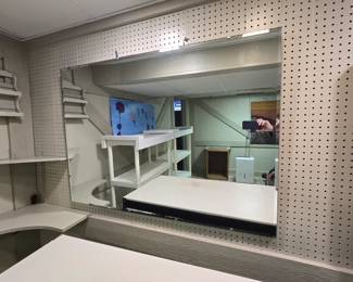 Large unframed mirror