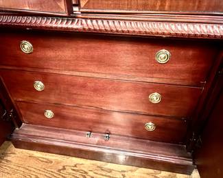 Cabinet has drawers in base