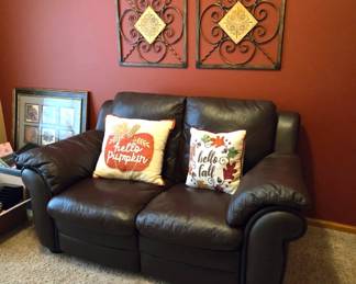 Fine Leather Sofa with Recliner on one side. 
