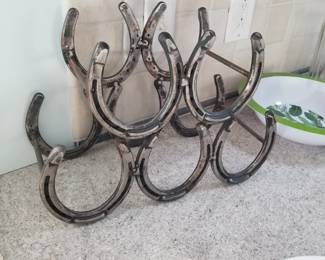 Horseshoe wine bottle holder