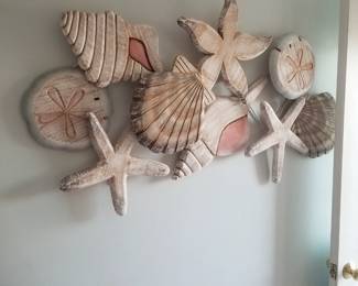 Dimensional shell art - carved wood