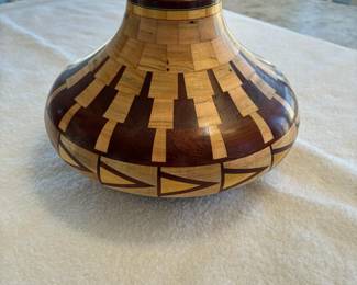 Closed segmented bowl, materials ambrosia maple,yellowheart,bloodwood, desert ironwork 