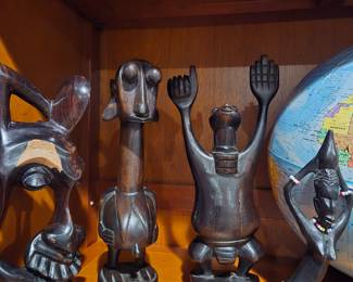 Lots of African art - these are only a few of the smaller pieces. We also have large framed masks for sale!