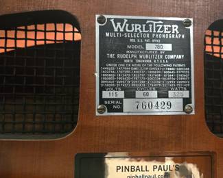 A restored and working 1940 vintage Wurlitzer 780 jukebox (wagon wheel mahogany wood)