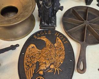 cast iron plaques and more and a spittoon 