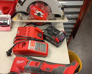 Milwaukee battery powered tool set and charger 
