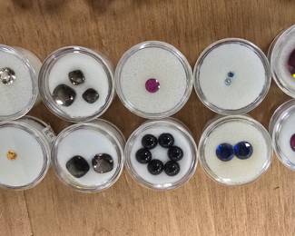 collection of semi-precious stones. diamonds, peridot, amethyst, topaz, citrine, and more