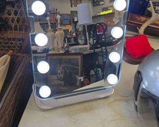 Vanity light that has a fan and does all kinds of stuff lol 