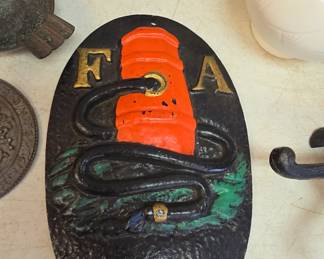 cast iron doorstops and plaques for fire stations  