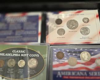 silver coins in different sets