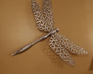 Large metal dragonfly sculpture