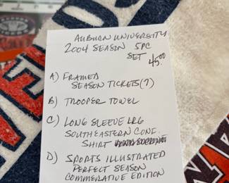 #97	Auburn 2004 Season 5pc set (season tickets, towel, conference shirt, commemorative book, sports illustrated)	 $ 45.00 																												