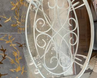 #50	Cream Iron Based Oval Coffee Table with beveled glass top - 46"x17.5"	 $ 50.00 																												