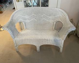 #55	White wicker love seat - (no cushions) 50"	 $ 40.00 																												