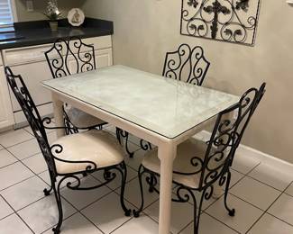 #1	Breakfast Table - Glass protect with tile top. 4 Metal Scroll Chairs with cream upholstery (heavy) 48.5x30x30	 $ 100.00 																												