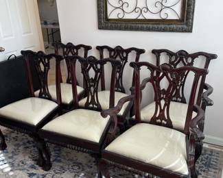 #5	Wood Dining Room ball and claw chairs - 2 captains chairs, 4 armless chairs. Cream striped upholstery. Made in indonesia	 $ 150.00 																												
