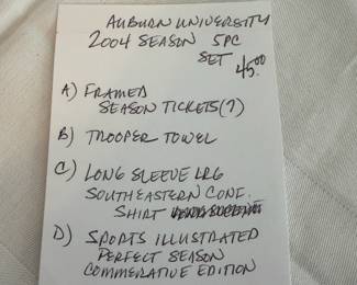 #97	Auburn 2004 Season 5pc set (season tickets, towel, conference shirt, commemorative book, sports illustrated)	 $ 45.00 																												