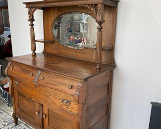 #4	Antique Carved Wood Oak Storage/Buffet - with beveled mirror. 2 pcs. 3 drawers, 2 doors. 3 shelves.48x27x82	 $ 350.00 																												