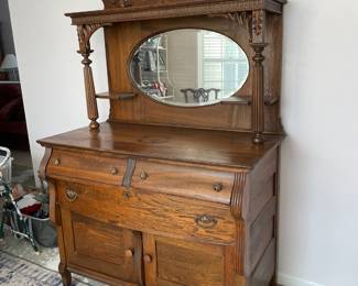 #4	Antique Carved Wood Oak Storage/Buffet - with beveled mirror. 2 pcs. 3 drawers, 2 doors. 3 shelves.48x27x82	 $ 350.00 																												